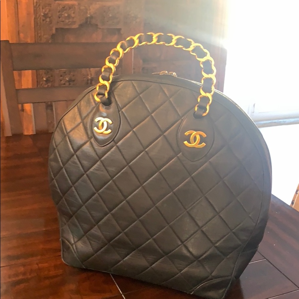 Black Quilted CHANEL travel bag
